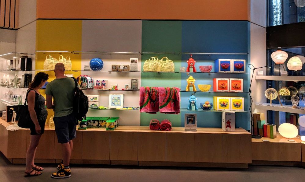 Caption: A photo of two people looking at items on a shelf at the Museum of Modern Art Design Store in New York City. (Local Guide Adrian Y)
