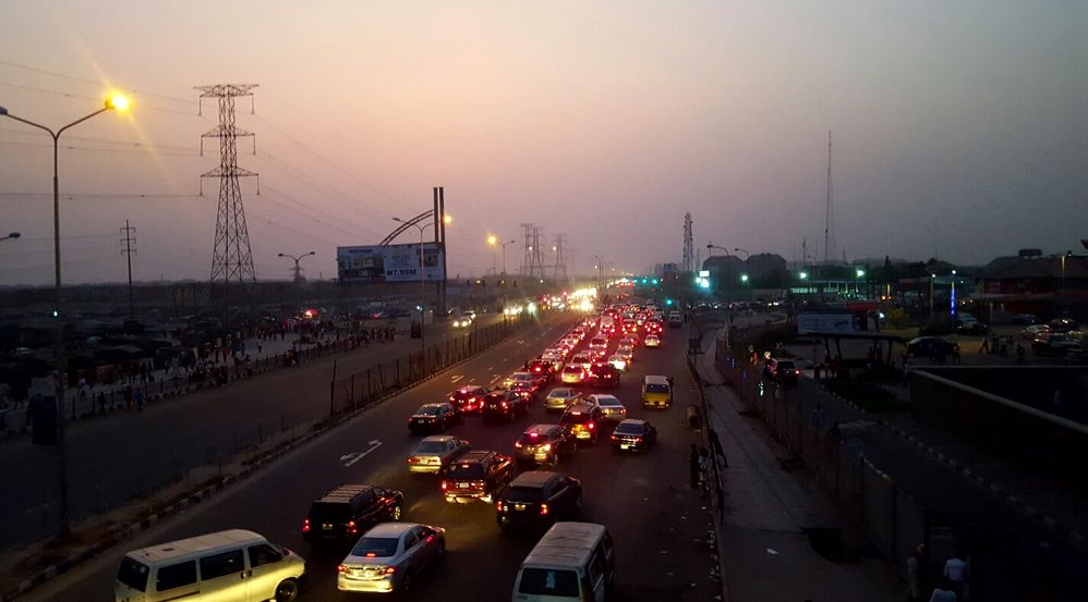 Caption: Cars in a traffic jam beside the Circle Mall, Lekki
