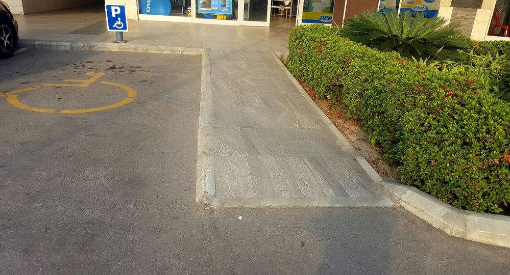 Caption: Dedicated  accessible Parking Spot with close ramp at the Cirle Mall
