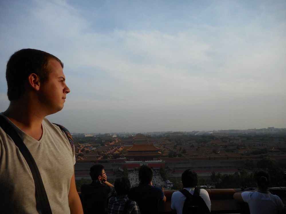Caption: A photo of me looking at the vast view of Beijing with the Forbidden City on the background. (Local Guide @TsekoV)