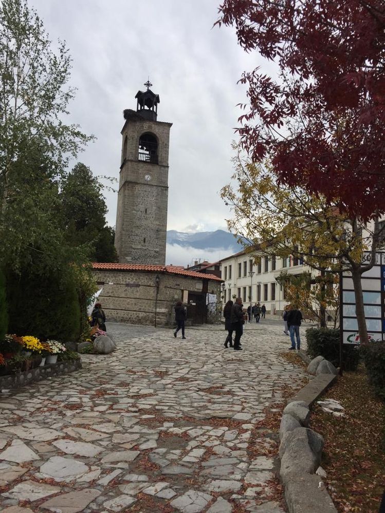 Caption: The main square in Bansko, featuring the Holy Trinity Church in the background. ( Local Guide AlexaAC)