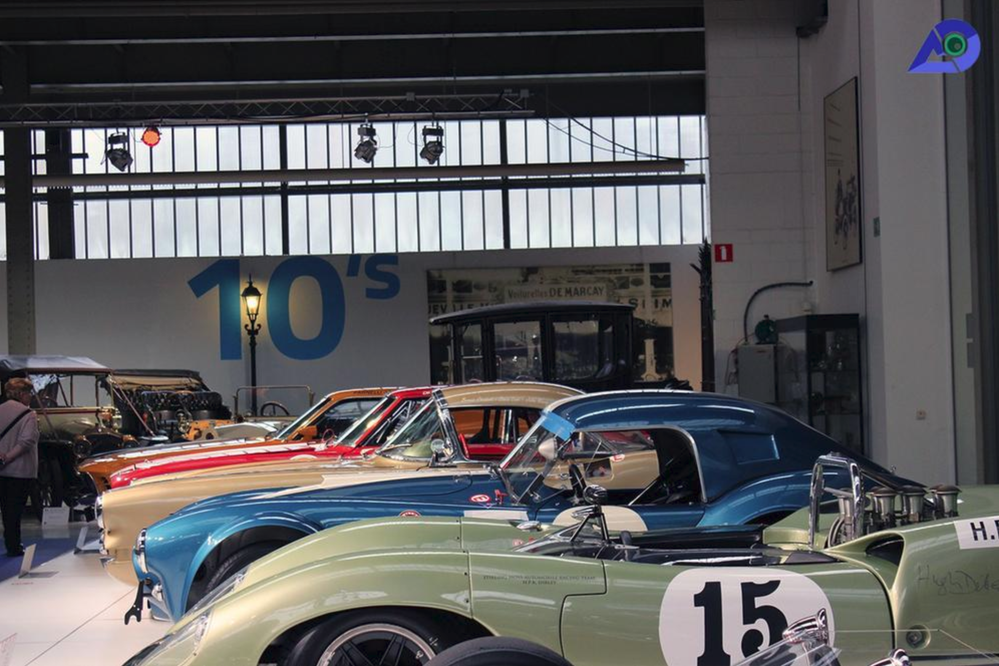 Caption: A photo of colorful vintage cars lined up inside the Autoworld museum in Brussels, Belgium. (Local Guide @parichaymehta)