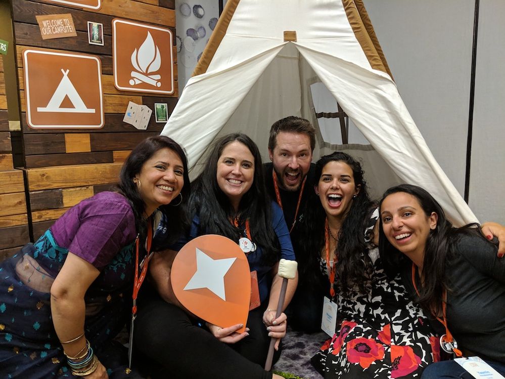 Caption: A photo of me with Local Guides Sonia, Ralph, Megan and Yasmin around the fake campfire in a tent at Connect Live 2018. This is the exact moment we decided we have the exact level of passion for the program and overall energy at Connect Live 2018.
