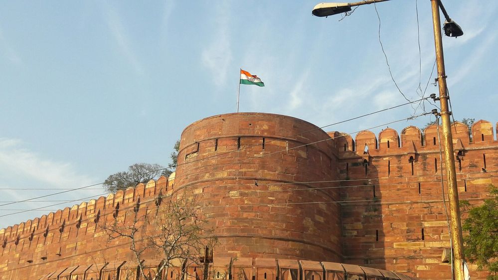 Caption: Indian Flag (tricolour) on Agra Fort.