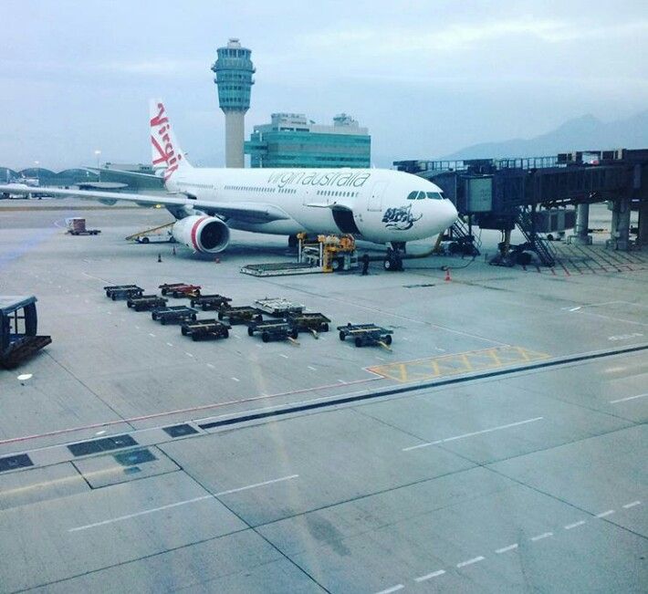 The tower,  the plane,  and the tarmak.        Travelling to Hongkong is always an exciting thing for me.  Not in my single travel  that I felt bored it is because from the airport alone İ can just point and shoot.  Am happy to share  this photo and see that being in the airport is not a boring thing but actually a little adventure..