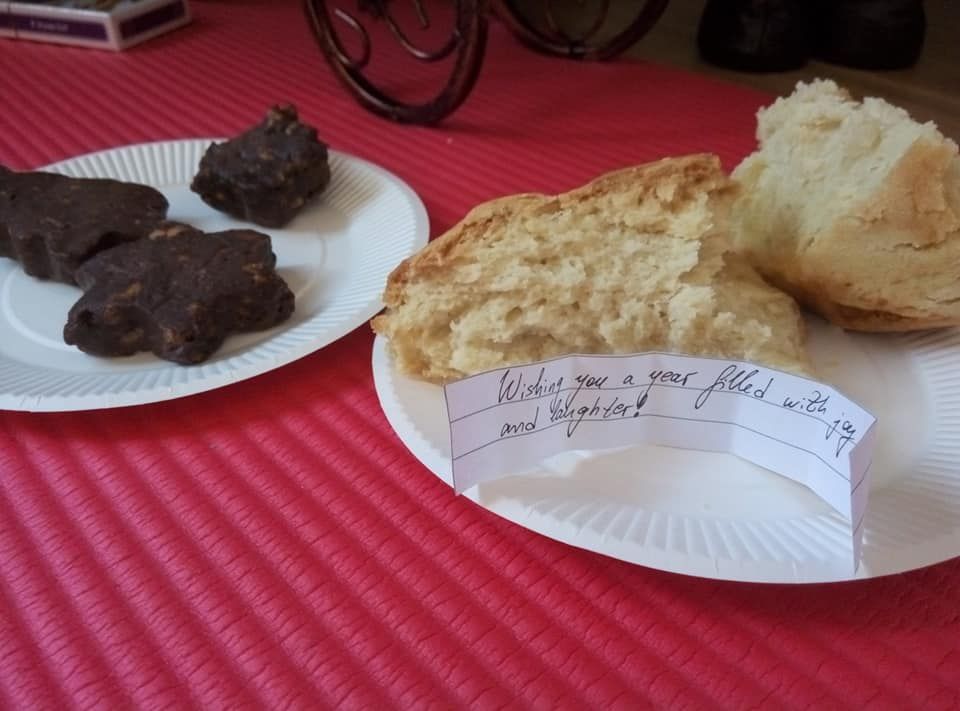 Caption: A photo of a piece of traditional bread "Pitka" with a lucky charm for the new year. (Local Guide @TsekoV)