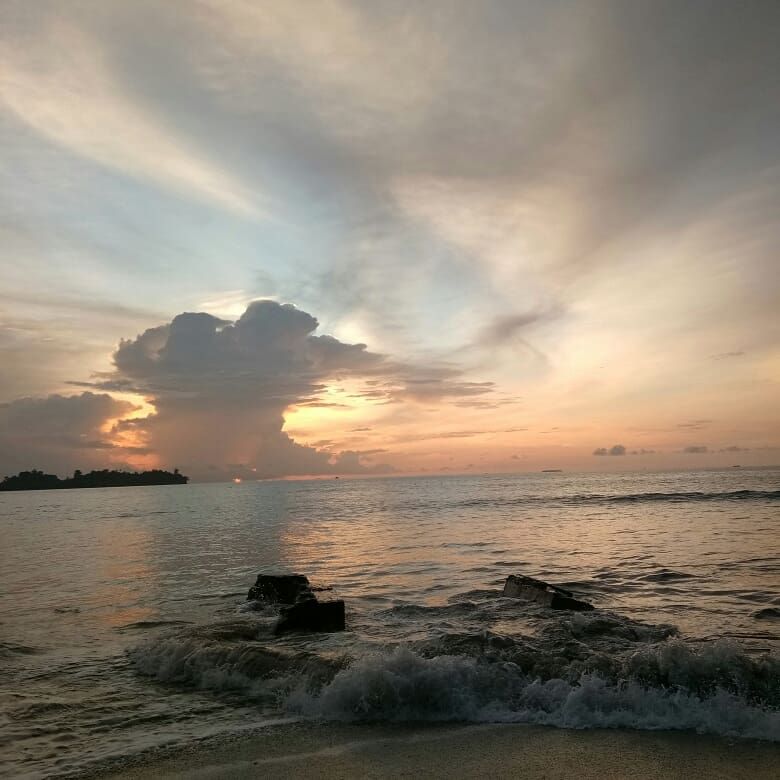 sunset at air manis beach,sumatera barat indonesia