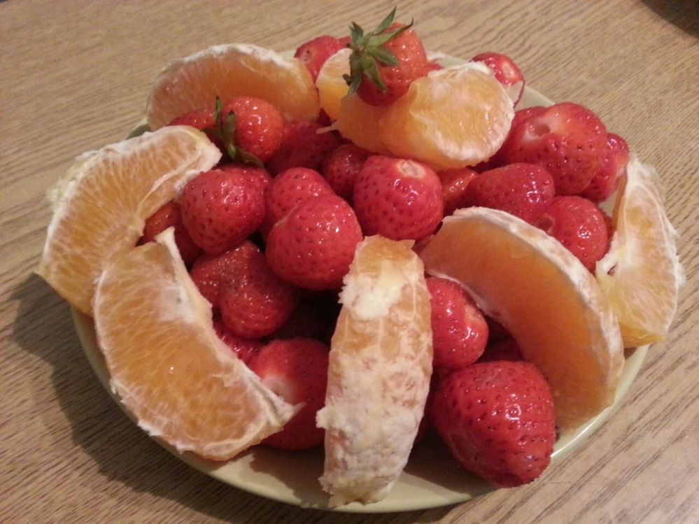 Caption:  A photo of fruit salad with strawberries and oranges (Local Guide @KatyaL)