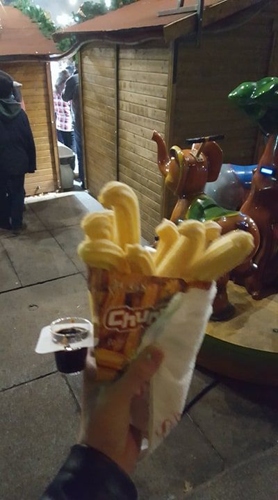 Caption: Churros with a small plastic pot filled with chocolate. (Local Guide VasT)