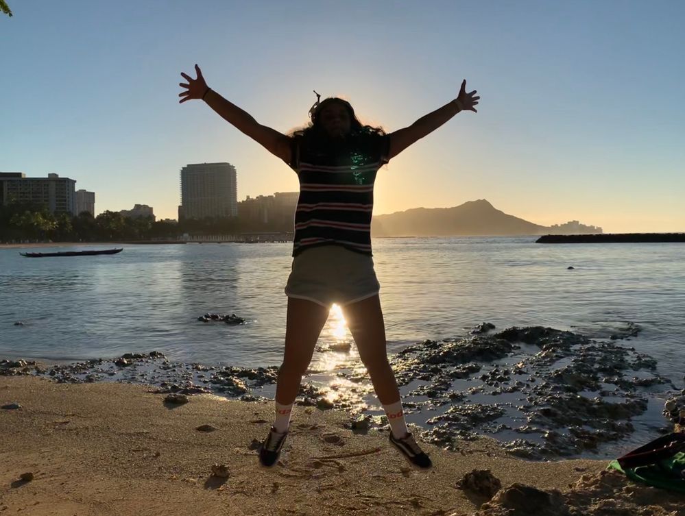 My daughter Chrystal jumping for me while the sun rises over Diamond Head, Waikiki Hawaii.