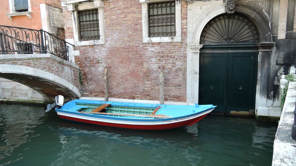 Caption: A private boat in front of a house door in Venice, Italy (@KatyaL)