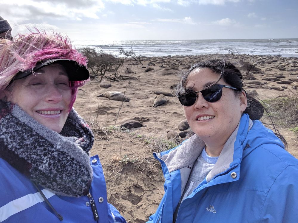 Tu and I on a rainy & windy hike to see the elephants seals!