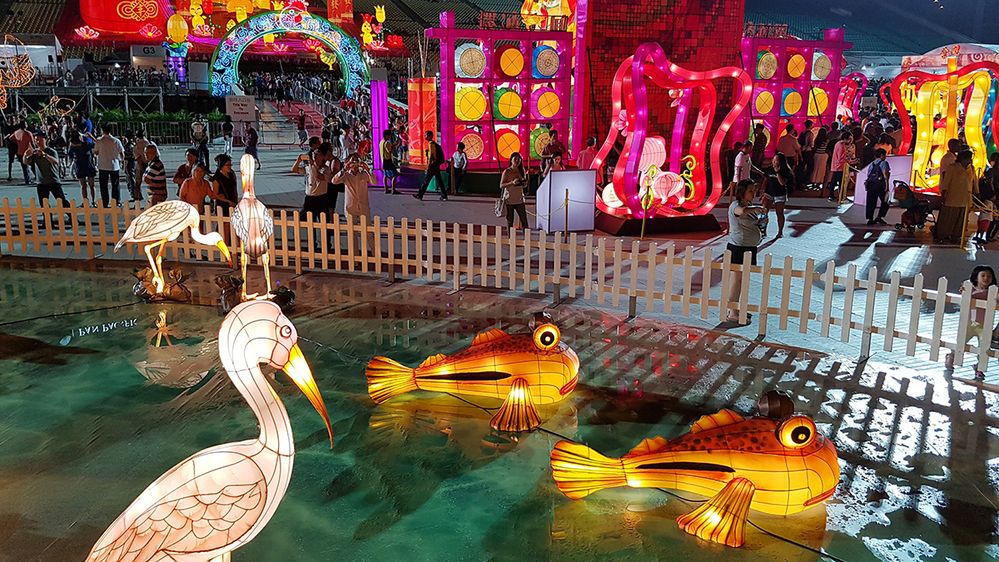 Caption: A photo of lit up animal lanterns on display in water at The Float @ Marina Bay during Lunar New Year in Singapore. (Local Guide Soon Teong Yeoh)