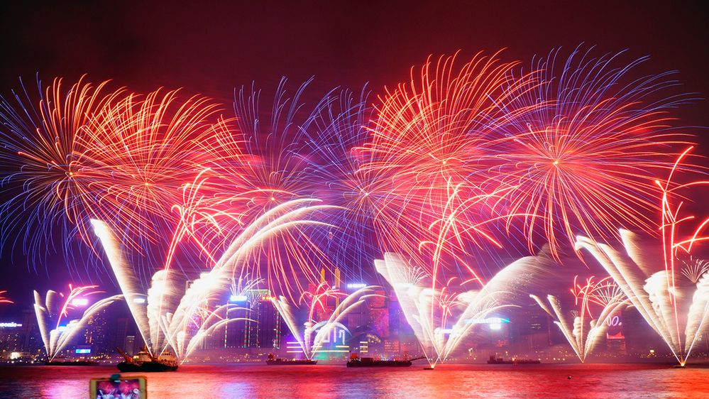 Caption: A photo of fireworks lighting up the sky for Lunar New Year in Victoria Harbour in Hong Kong. (Local Guide 翰騰林)