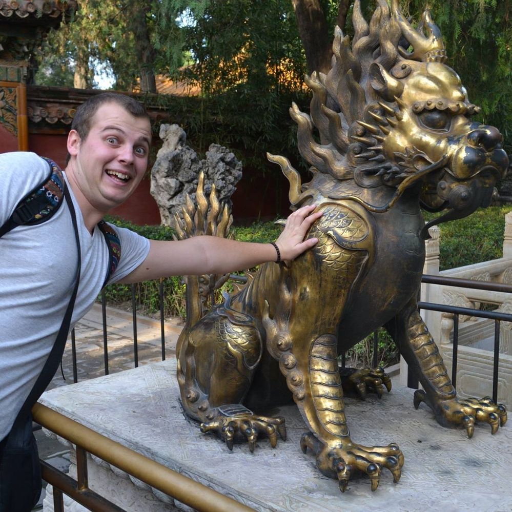 Caption: A photo of me posing with an Imperial Garden Lion in the Forbidden City in Beijing. (Local Guide @TsekoV)