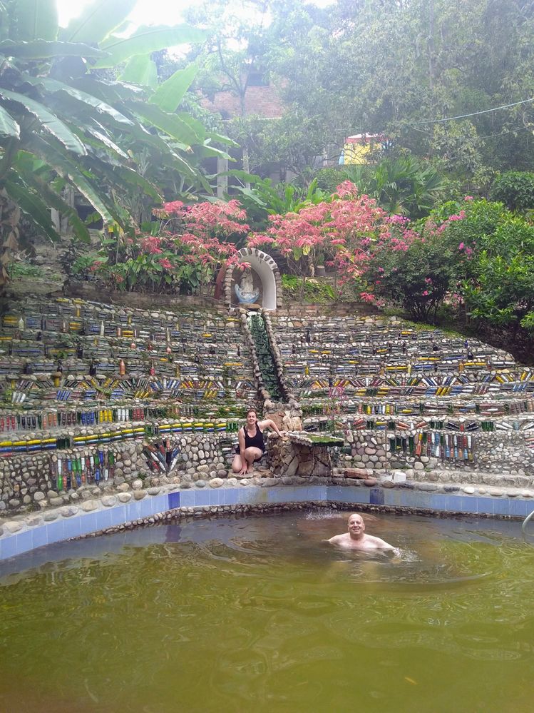 A couple take a bath in one of the thermal water pool of El Raizón