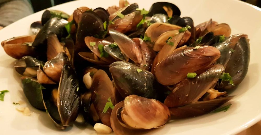 Caption: Photo of mussels on a white plate in Made in Home, Sofia (Local Guide @Petra_M)