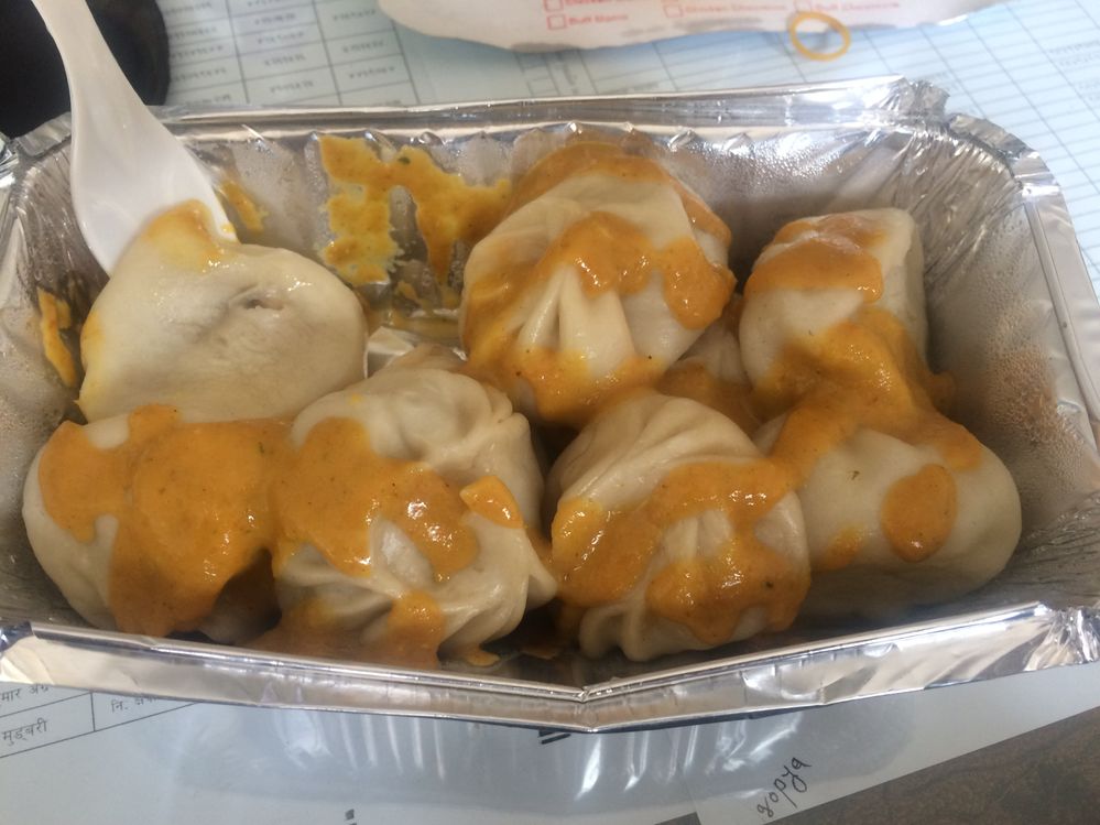 Nepali chicken dumplings (momo) Momo (dumplings) is one of Nepal's most popular dishes which can be eaten as an entree or as mains. It's a dumpling filled with meat or vegetables as well. It is eaten with tomato pickle (golbheda ko achar).