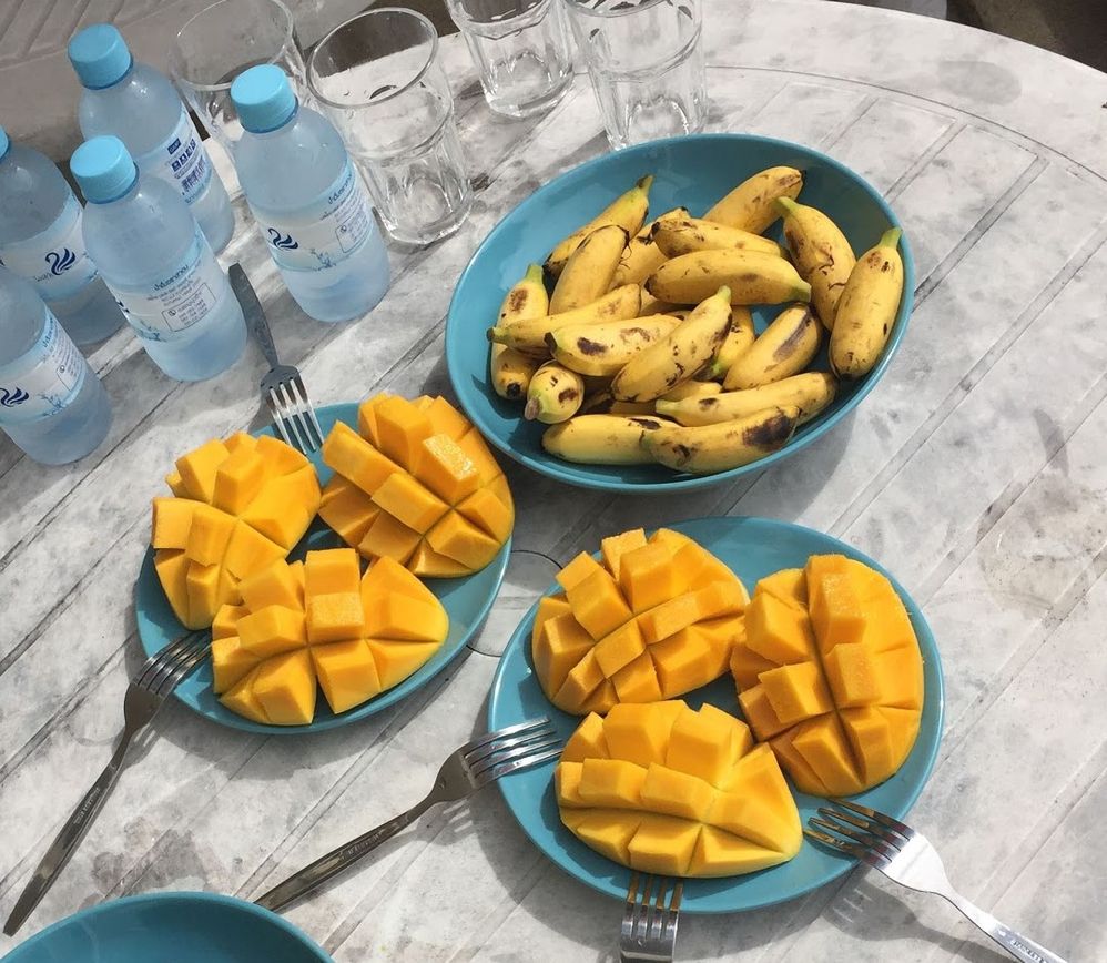 Caption: A photo of cut mango fruit and small bananas. (Local Guide @TsekoV)