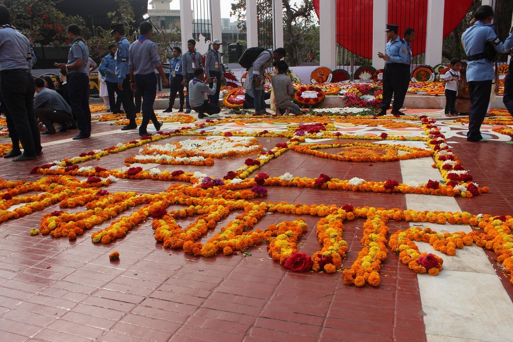 Design by flower in front of Shahid Minar