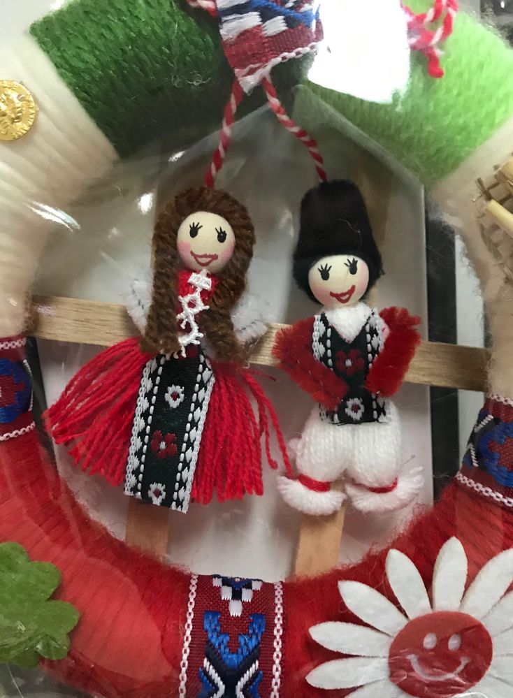 Caption: A photo of Bulgarian traditional Martenitsa showing a boy and a girl dressed with national Bulgarian costumes (Local Guide @KatyaL)