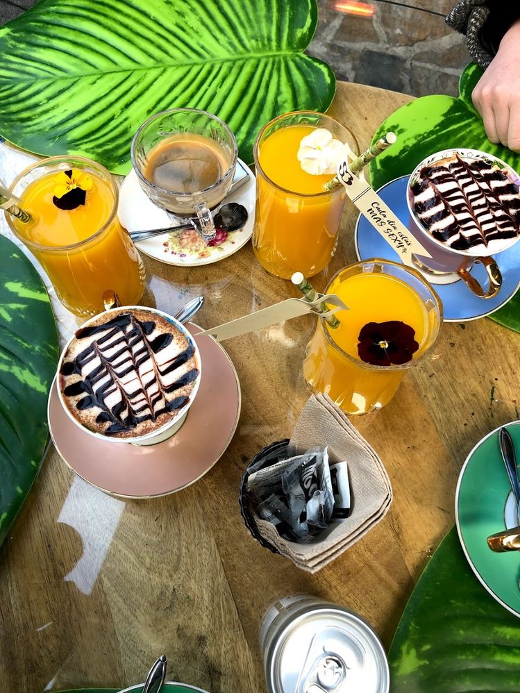Caption: A photo showing table with coffees and orange juices. (Local Guide @Ivi_Ge)