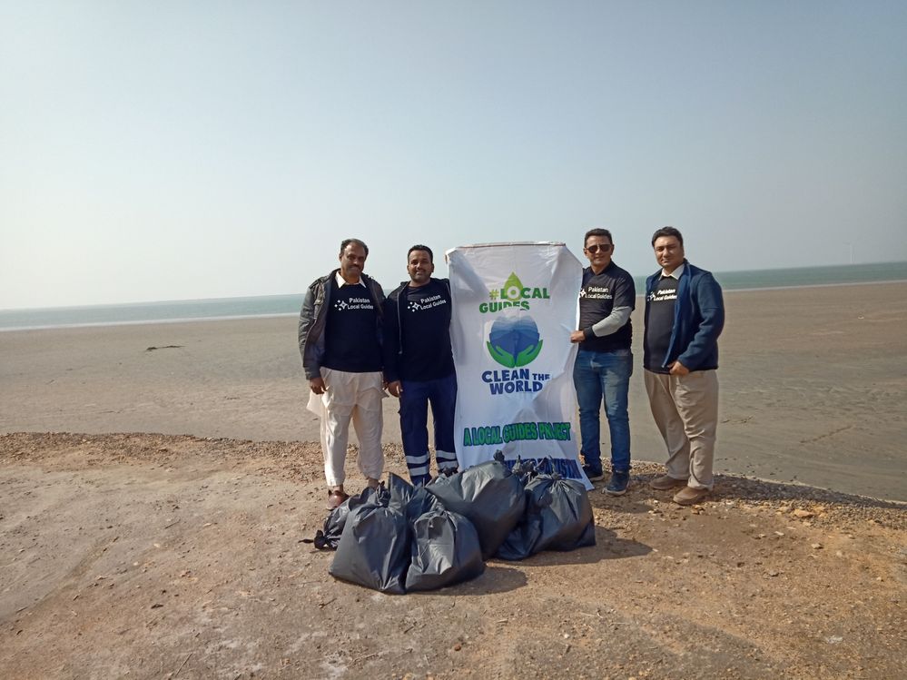 Team Pakistan Local Guides with The Logo Of Clean The World & Collected Plastic Wastage