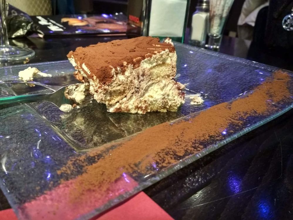 Caption: A photo of a dessert, cinnamon on the plate and top of the photo. (Local Guide @TsekoV)