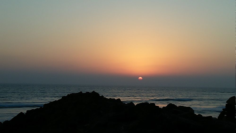 Sunset at sea beach near Dwarka....