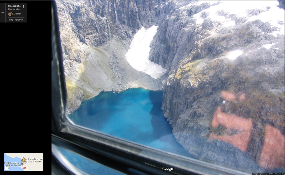A blue glacial lake 8000 feet below.