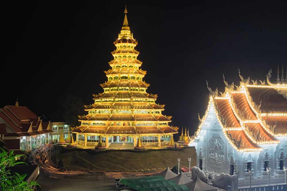 Makha Bucha Day - Light trails of the procession around Wat Hyua Pla Kang's pagoda
