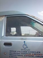 Caption: Photo showing SCIAN bus with wheelchair logo on it