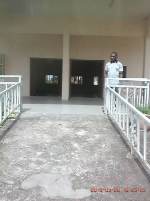 Caption: Photo of a wheelchair ramp at the entrance of tSCIAN event hall