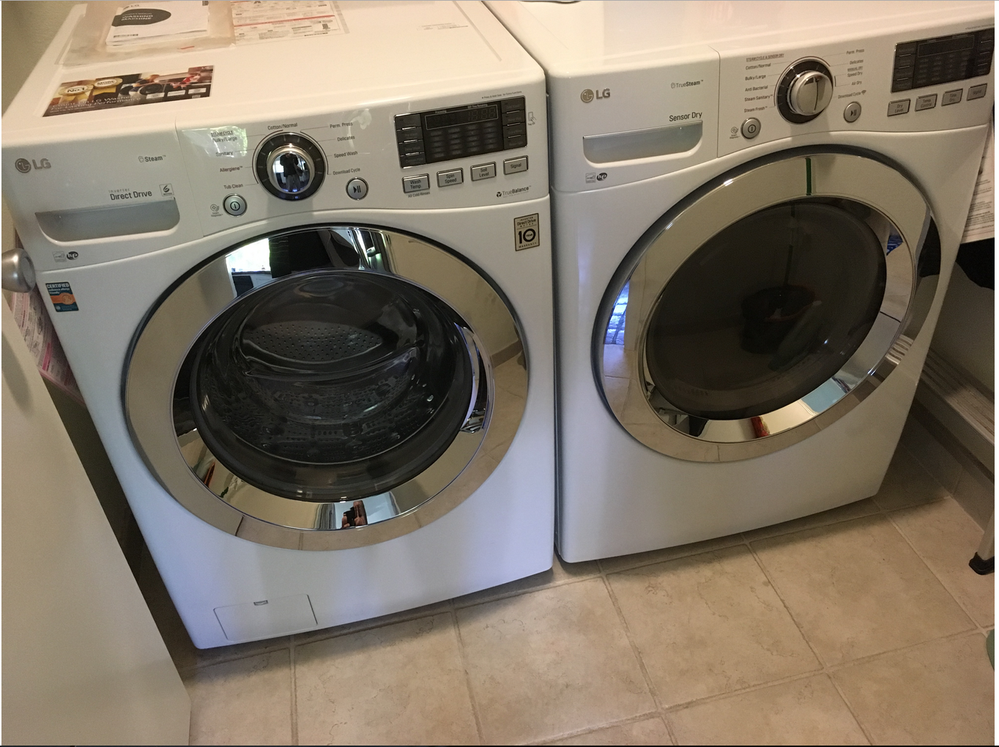 LG  front load washer / dryer combo.