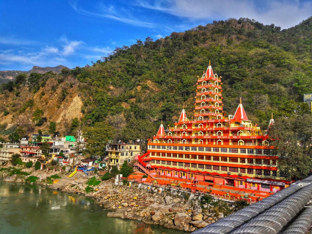 Caption: A very famous Trayambakeshwar Temple, which is situated near Laxman Jhula and the sacred river Ganges passes near the temple (Photo by Local Guide Ishant Gautam).