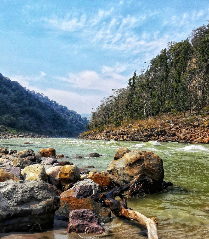 Caption: Sacred river Ganges passing from the rocks near a ghat in Rishikesh, Uttarakhand, India (Photo by Local Guides Ishant Gautam).