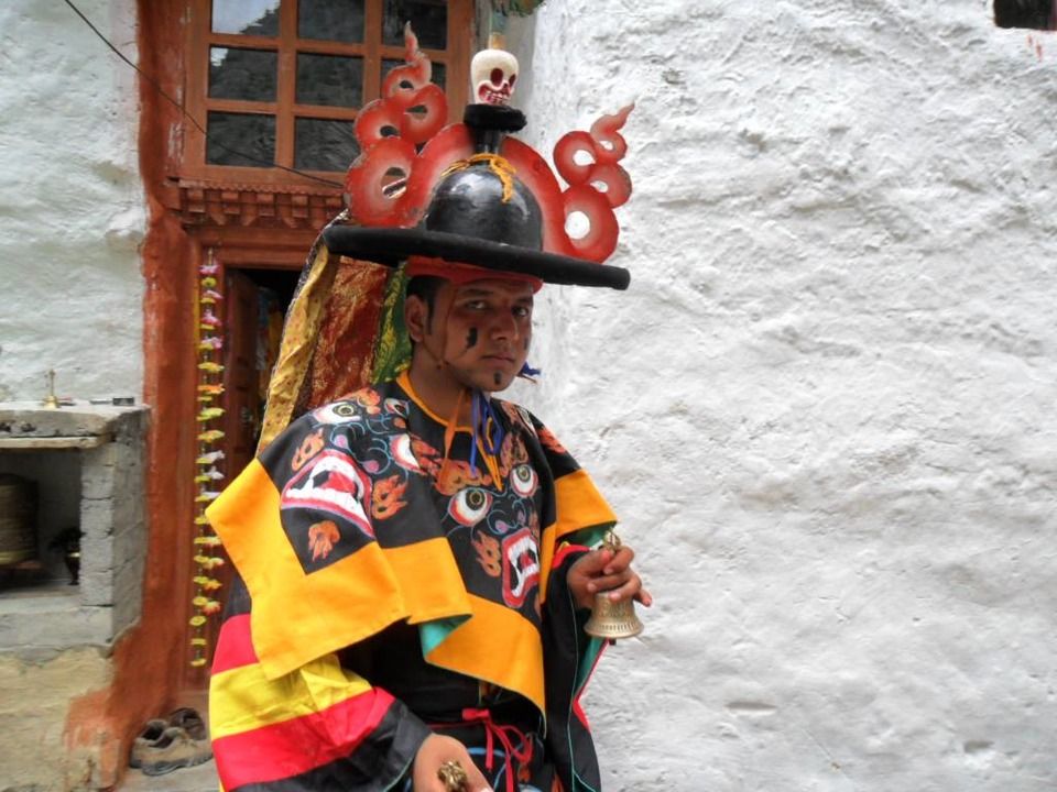 Monk going to perform 'Chham'  dance. Chham is a masked dance performed by buddhist  monks
