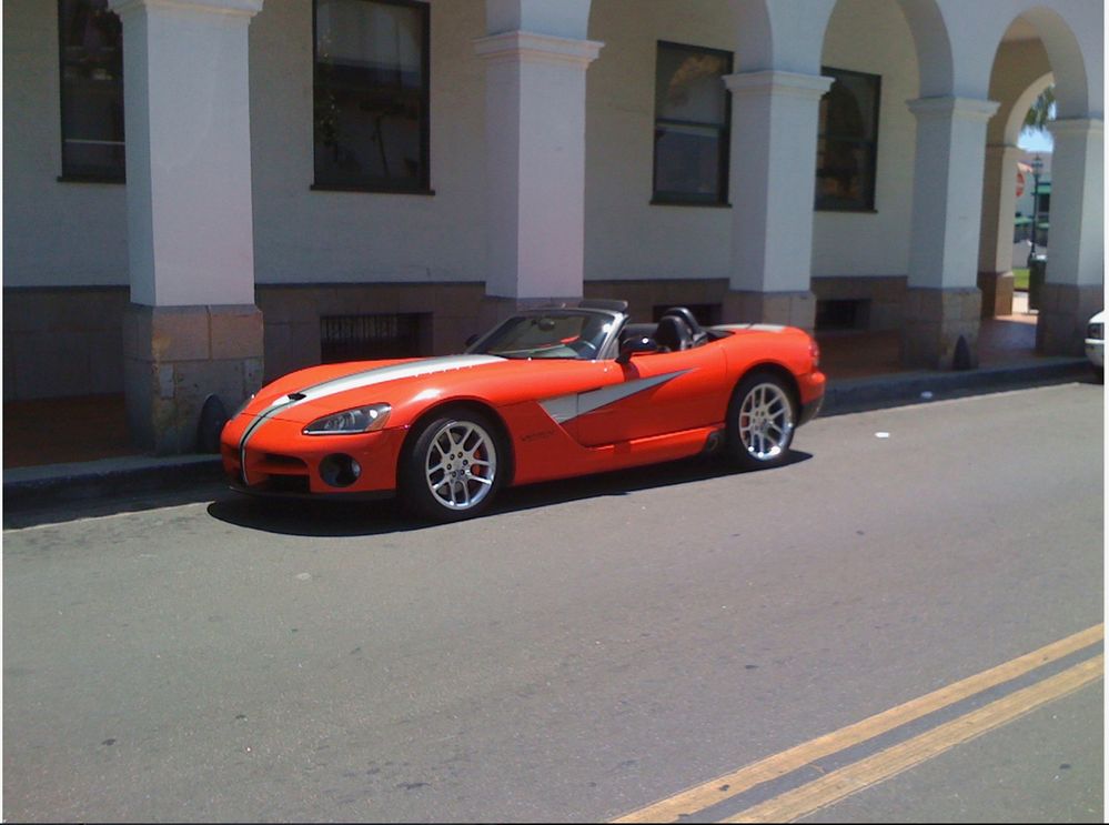 Dodge Viper in front of an historic building.