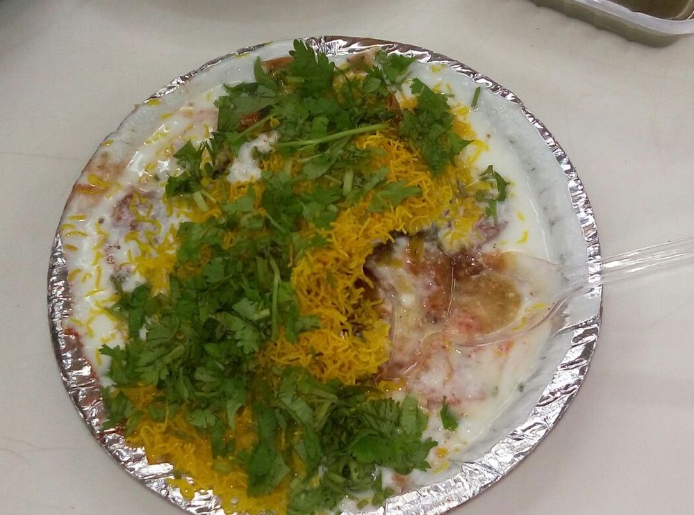 Dahi poori ( yoghurt on top of lots of crisp snaks)