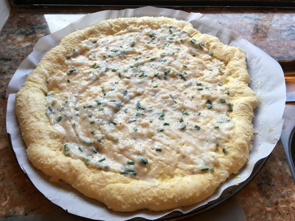 Spread Bechamel sauce with added chopped Chives.