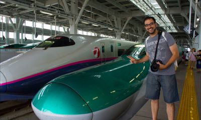 Me at Shin-Aomori station with two gorgeous shinkansen (yes, I love trains :D)