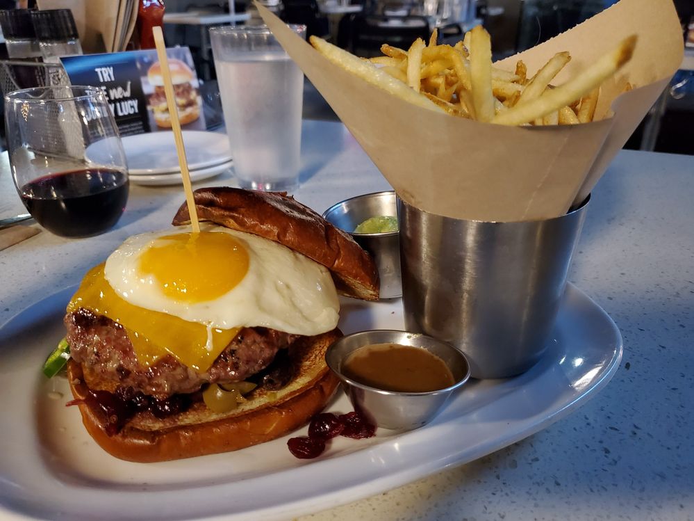 1lb burger with an egg to top it off. Can't forget the fries to go along with it. The Counter restaurant