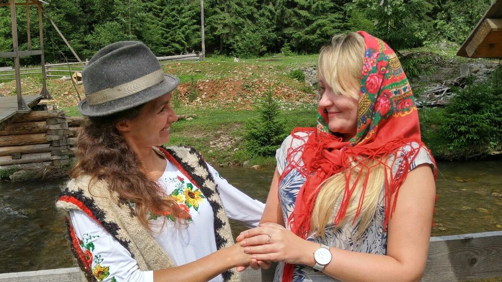 Caption: Two ladies in traditional jackets, hat and headscarf from Sinevir lake, the Carpathians, Ukraine (LG uavalentine)