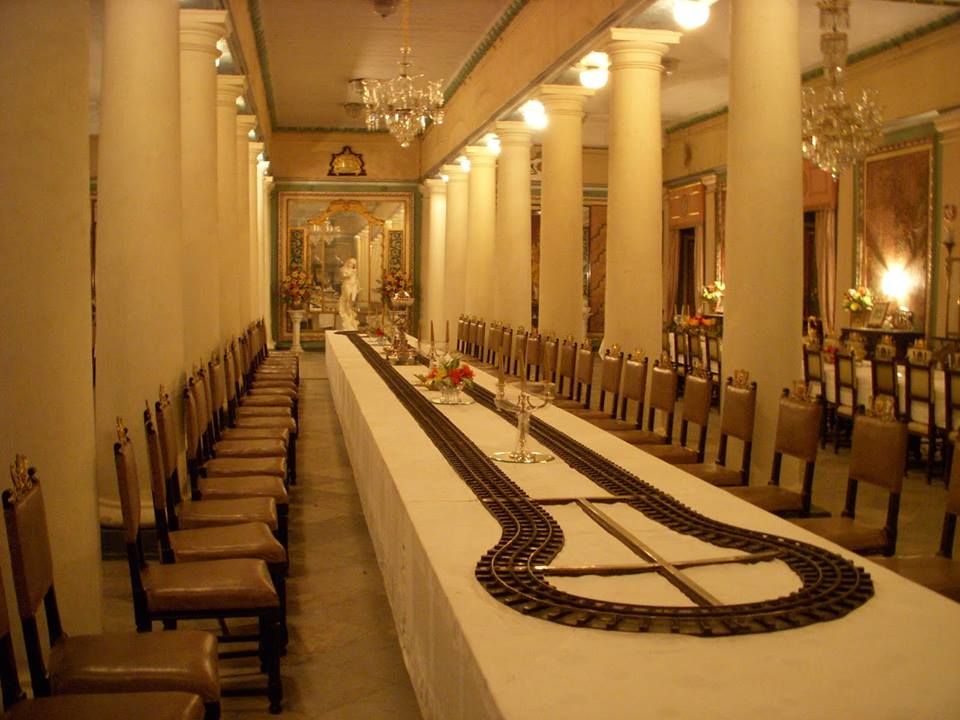 A photo of dining table with train track.