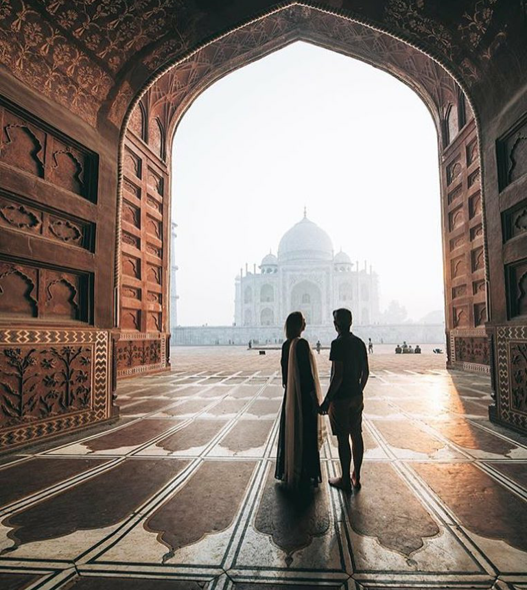 Couples taking photos like britain's royal couple had taken previously at Taj