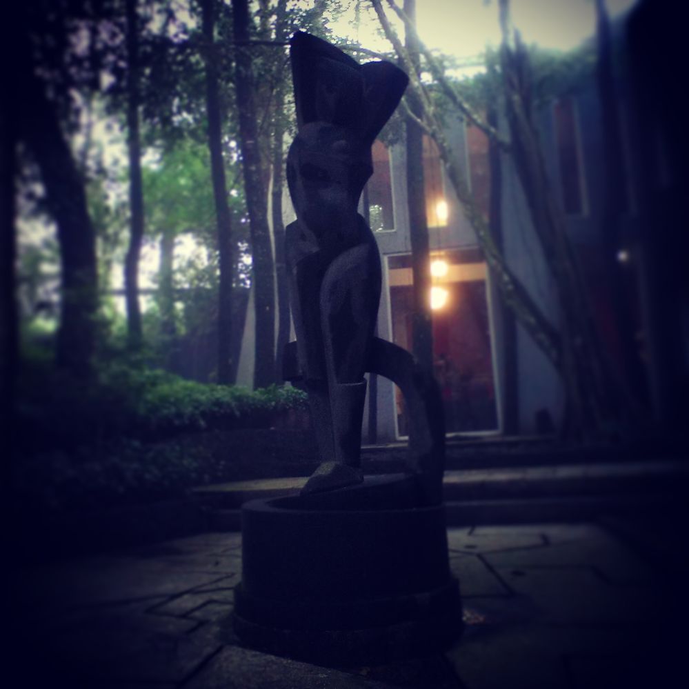 contemporary statue outside museum and misty evening (private doc)