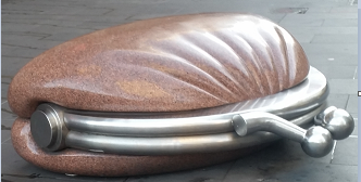 Photo of purse on the pavement -Sculpture with a twist #1 (by @AdamGT)