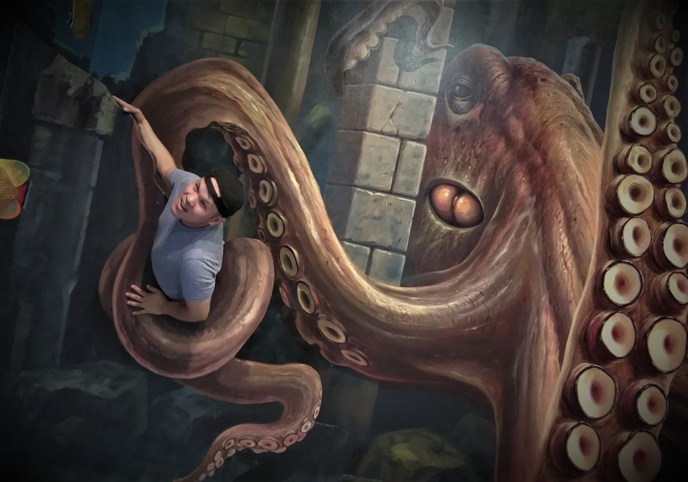 Photo Caption : Local Guides Radja Trapped in the grip of an octopus