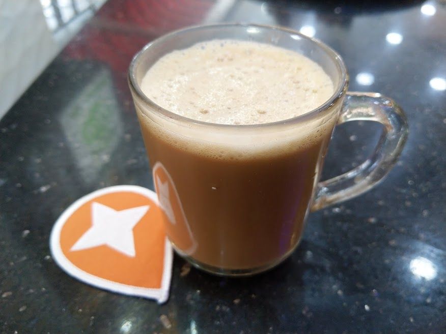 A cup of  Teh tarik with Local Guides badge. Photo Captured from The Chennai Spice Restaurant, Cyberjaya, Malaysia