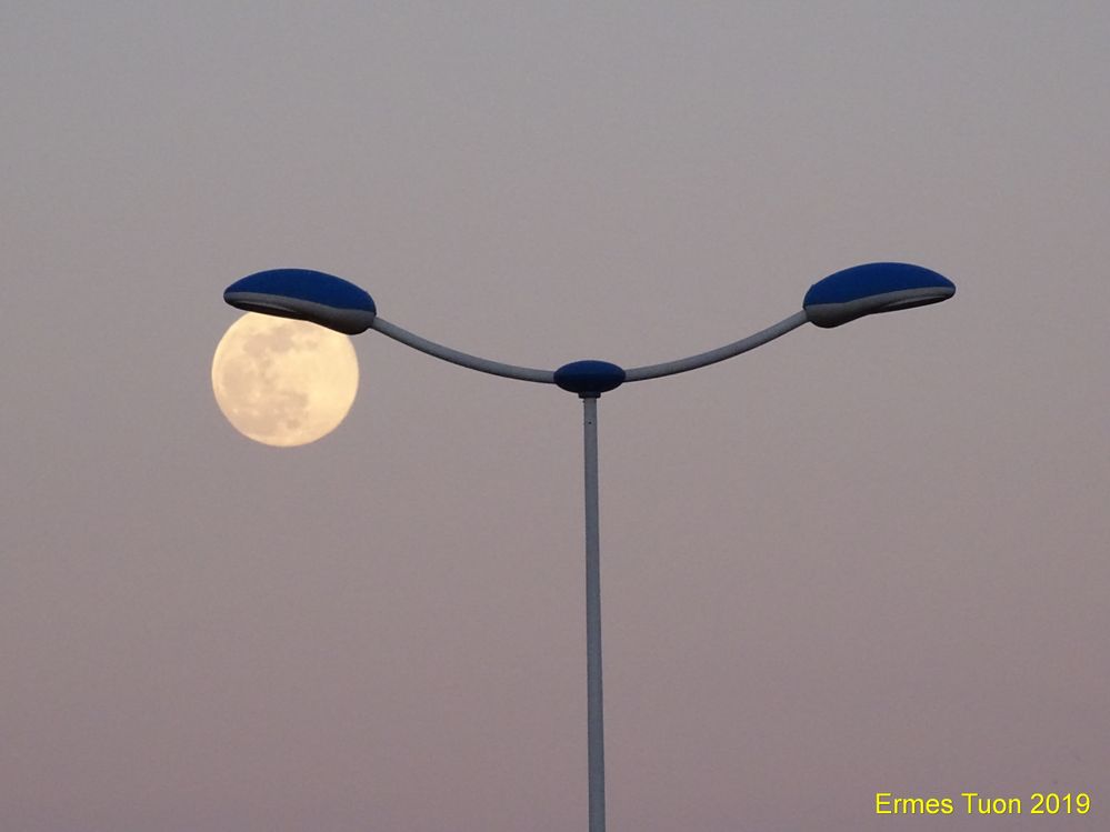 Caption: the moon shaped on a street lamp - Photo Credit: Local Guide @ermest